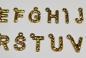 Preview: (ABC7) - Buchstaben-Set A-Z aus Metall Farbe : gold - ca. 1,2x0,85 cm unebene Oberfläche, zum Annähen / Ankleben