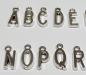 Preview: (ABC4) - Buchstaben-Set A-Z aus Metall Farbe : silber - ca. 1,25x0,6 cm zum Annähen / Ankleben