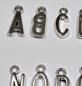 Preview: (ABC4) - Buchstaben-Set A-Z aus Metall Farbe : silber - ca. 1,25x0,6 cm zum Annähen / Ankleben